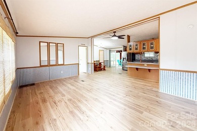 Nestled on a breathtaking 1.29-acre lakefront lot, this - photo 3