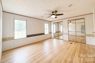 Nestled on a breathtaking 1.29-acre lakefront lot, this - photo 6