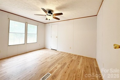 Nestled on a breathtaking 1.29-acre lakefront lot, this - photo 9
