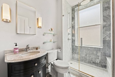 This exceptional 25-foot-wide single-family brownstone sits in - photo 12