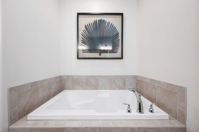 Experience elevated living in this modern 4-bed, 4.5-bath luxury