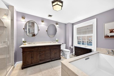 This exceptional 25-foot-wide single-family brownstone sits in - photo 24