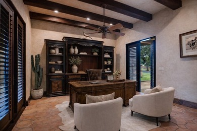 A front courtyard fireplace sets the tone, where the glow of the - photo 29