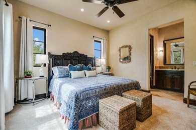A front courtyard fireplace sets the tone, where the glow of the - photo 33