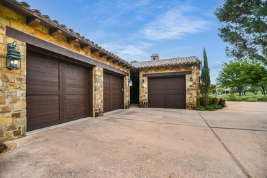 A front courtyard fireplace sets the tone, where the glow of the - photo 41