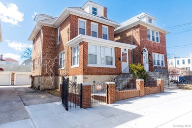 Welcome to 2021 Haight Avenue, a detached brick two family home - photo 2