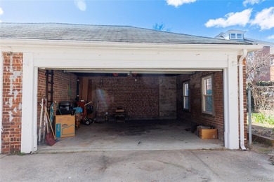 Welcome to 2021 Haight Avenue, a detached brick two family home - photo 3