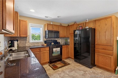 Take a look at this beautiful 4-bedroom, 2-bath home at the Lake - photo 14