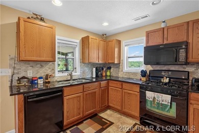 Take a look at this beautiful 4-bedroom, 2-bath home at the Lake - photo 15