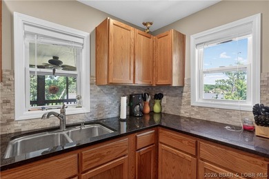 Take a look at this beautiful 4-bedroom, 2-bath home at the Lake - photo 18
