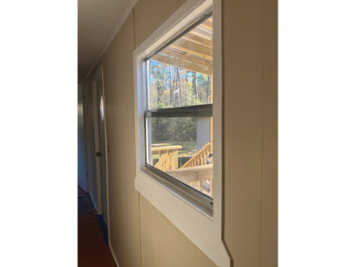 This 1975 MH is being totally remodeled. New floors, ac/htg unit - photo 12