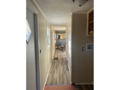 This 1975 MH is being totally remodeled. New floors, ac/htg unit - photo 13