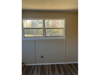 This 1975 MH is being totally remodeled. New floors, ac/htg unit - photo 14
