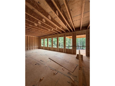 Traton Homes, Dunning elevation *C* on a basement with a 3- car - photo 9