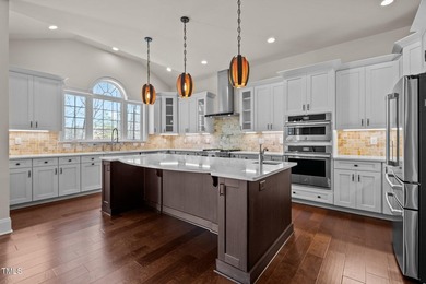 Situated on a premium 0.89-acre lot in Wake Forest's highly - photo 19