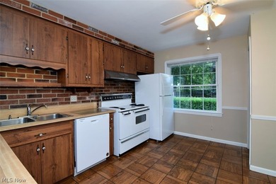 This charming and well maintained brick home has been in the - photo 12