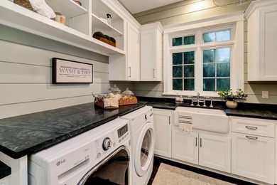 Extraordinary Custom lakefront home by Colby Construction on - photo 17