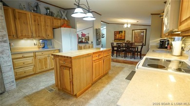 Welcome to your lakefront retreat! This super cute, updated 4 - photo 18