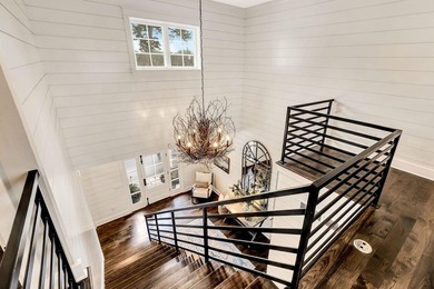 Extraordinary Custom lakefront home by Colby Construction on - photo 18