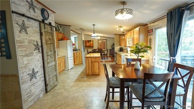 Welcome to your lakefront retreat! This super cute, updated 4 - photo 19