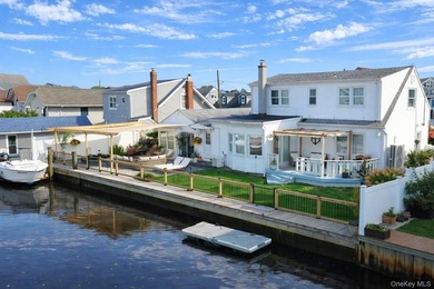 Welcome to this beautifully renovated 4-bedroom, 2-bath - photo 2