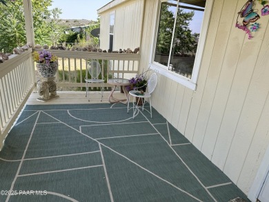 Charming 3-bedroom home on a spacious lot in Mayer! Enjoy the