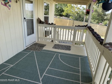 Charming 3-bedroom home on a spacious lot in Mayer! Enjoy the