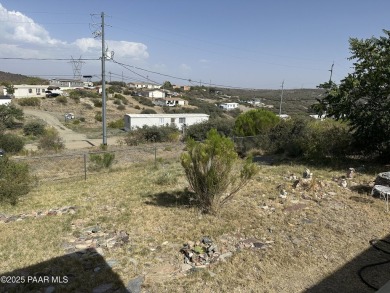 Charming 3-bedroom home on a spacious lot in Mayer! Enjoy the