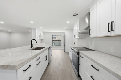 Fully remodeled 3-bedroom, 2-bath home with an attached garage - photo 16