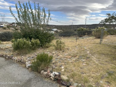 Charming 3-bedroom home on a spacious lot in Mayer! Enjoy the