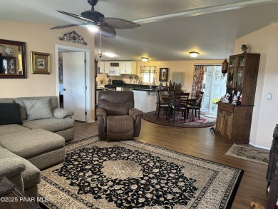 Charming 3-bedroom home on a spacious lot in Mayer! Enjoy the
