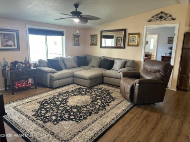 Charming 3-bedroom home on a spacious lot in Mayer! Enjoy the