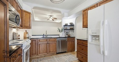 This delightful 2-bedroom, 2-bath townhome is primed for its new - photo 9