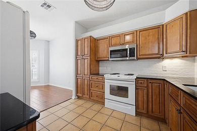 This delightful 2-bedroom, 2-bath townhome is primed for its new - photo 10