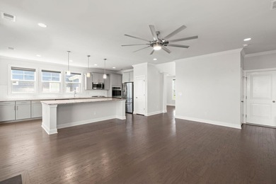 Beautifully positioned on a peaceful pond homesite in the highly - photo 17