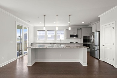 Beautifully positioned on a peaceful pond homesite in the highly - photo 18