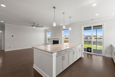 Beautifully positioned on a peaceful pond homesite in the highly - photo 21