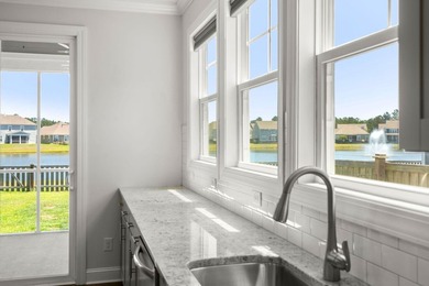 Beautifully positioned on a peaceful pond homesite in the highly - photo 24