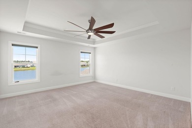 Beautifully positioned on a peaceful pond homesite in the highly - photo 34