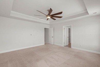 Beautifully positioned on a peaceful pond homesite in the highly - photo 36