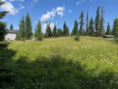 Tucked into a peaceful pocket near Swan Lake, this .67-acre lot - photo 3