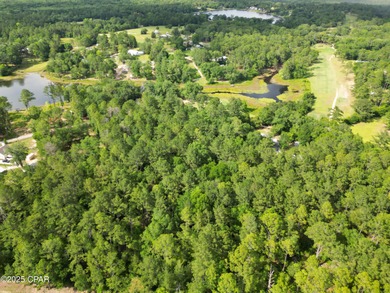 Discover 1.28 acres of peaceful, wooded land on Fairway Drive - photo 9