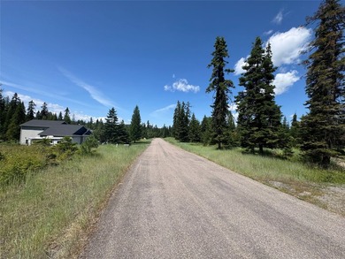 Tucked into a peaceful pocket near Swan Lake, this .67-acre lot - photo 9