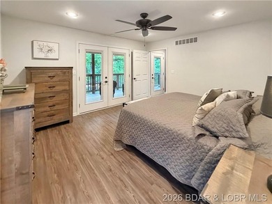 Lake-view property featuring a main residence(28251 Shore Rd) - photo 23