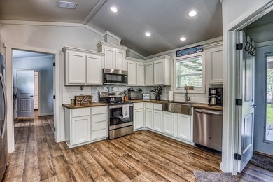 ***PRICE REDUCTION*** Nestled on a serene one-acre lot, this - photo 13