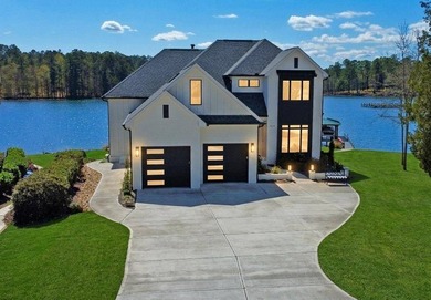 Where Lakefront Luxury Meets Timeless Design. 524 Grand Harbor - photo 1