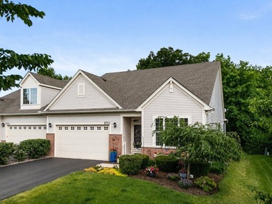 Backing to woods and featuring a screened porch and finished - photo 1