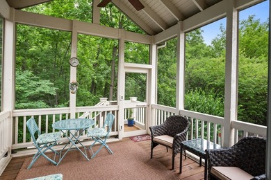 Backing to woods and featuring a screened porch and finished - photo 2