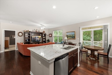 Backing to woods and featuring a screened porch and finished - photo 3