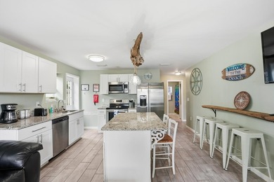Fully renovated beach cottage and RENTAL MACHINE only .3 miles - photo 11